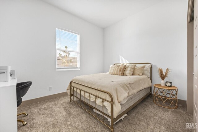 bedroom featuring carpet