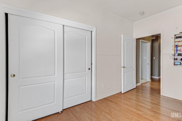 5510 Edge Water Ct, Bakersfield, CA 93312 - unfurnished bedroom with light wood-type flooring and a closet