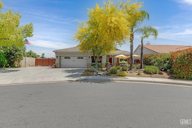 5510 Edge Water Ct, Bakersfield, CA 93312 - view of front of property with a garage, concrete driveway, and stucco siding