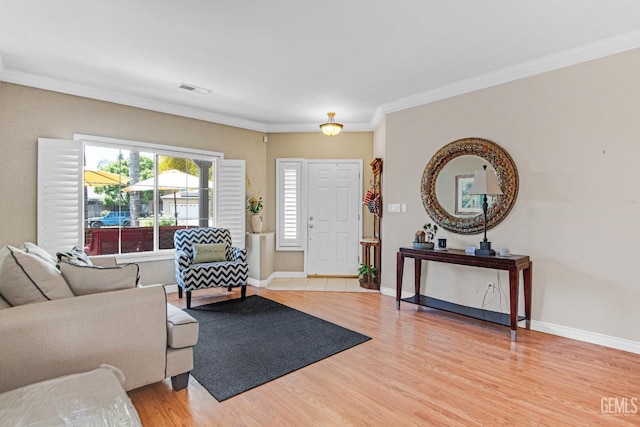 5510 Edge Water Ct, Bakersfield, CA 93312 - living area featuring light wood-style flooring and ornamental molding