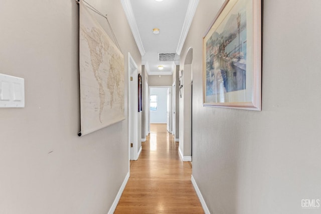 5510 Edge Water Ct, Bakersfield, CA 93312 - corridor featuring ornamental molding, light wood-style floors, and attic access