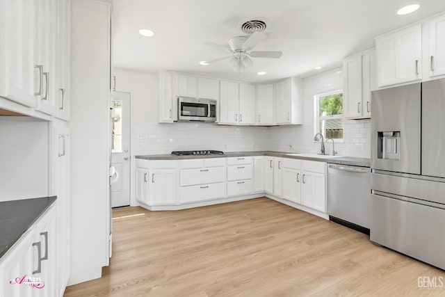 1825 Camino Primavera, Bakersfield, CA 93306 - kitchen with appliances with stainless steel finishes, ceiling fan, white cabinets, and recessed lighting