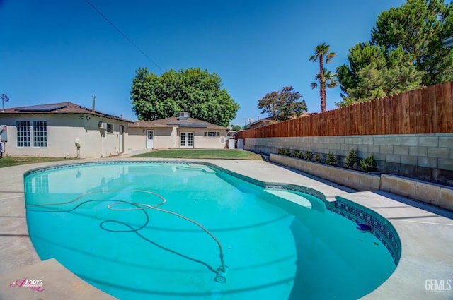 1825 Camino Primavera, Bakersfield, CA 93306 - view of swimming pool featuring french doors and a fenced backyard