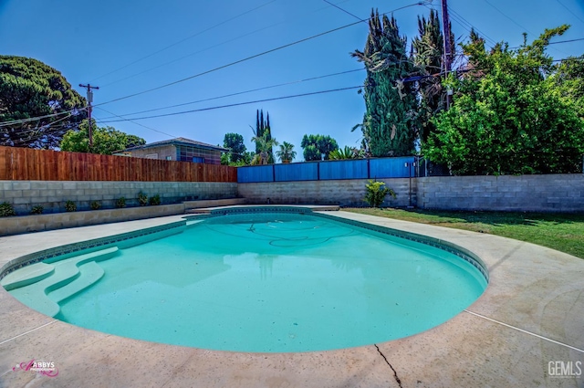 1825 Camino Primavera, Bakersfield, CA 93306 - view of swimming pool featuring a fenced backyard