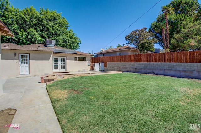1825 Camino Primavera, Bakersfield, CA 93306 - fenced backyard with french doors and a patio