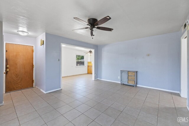1805 Morgan Ln, Bakersfield, CA 93306 - unfurnished room featuring a ceiling fan, baseboards, and light tile patterned flooring