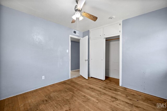 1805 Morgan Ln, Bakersfield, CA 93306 - unfurnished bedroom featuring light wood-style flooring, a closet, and a ceiling fan