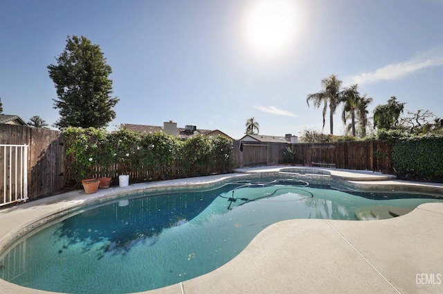 view of pool featuring a fenced in pool and a fenced backyard