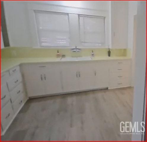 bathroom with wood finished floors