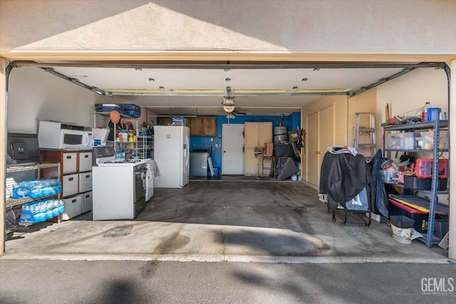 garage with freestanding refrigerator