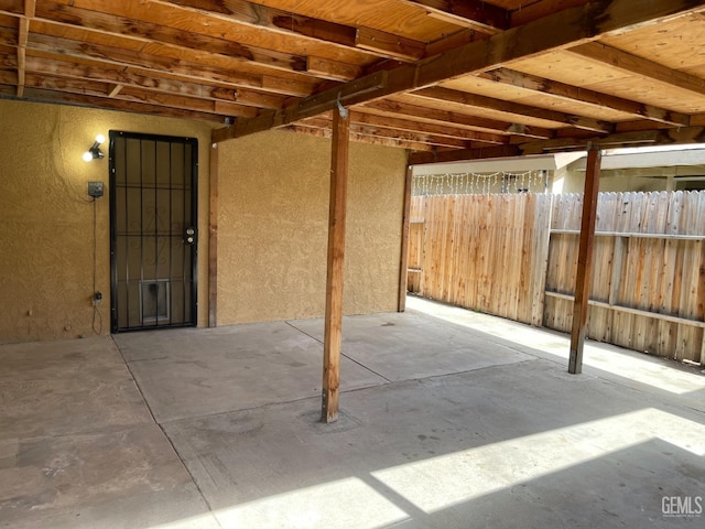 view of patio / terrace featuring fence