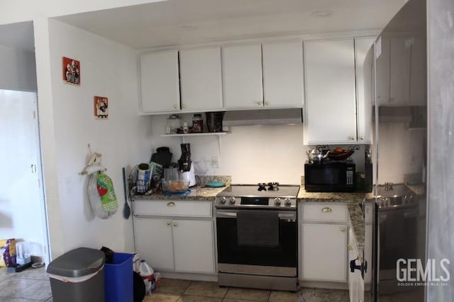 kitchen with stone counters, white cabinetry, and stainless steel range with electric cooktop