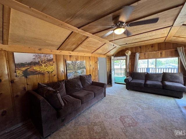 1 Jasper Ave, Rosamond, CA 93561 - carpeted living room featuring lofted ceiling, wooden walls, ceiling fan, and wooden ceiling