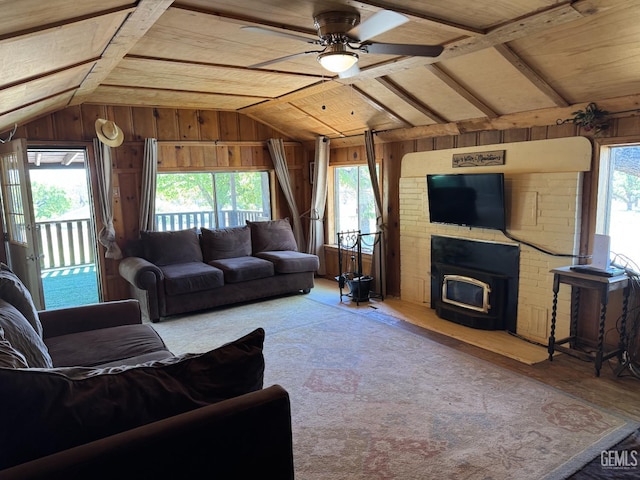 1 Jasper Ave, Rosamond, CA 93561 - living area with lofted ceiling, wood walls, a ceiling fan, wood finished floors, and wooden ceiling