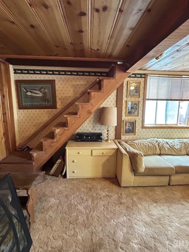 48718 Sugarpine Trl, Posey, CA 93260 - unfurnished living room featuring wallpapered walls, light carpet, and stairway
