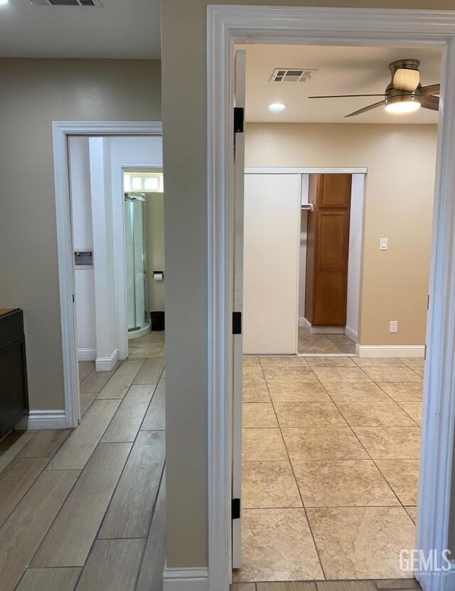 706 A St, Bakersfield, CA 93304 - corridor featuring baseboards and recessed lighting