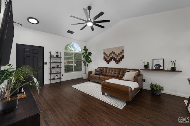 living room with lofted ceiling, visible vents, a ceiling fan, wood finished floors, and baseboards