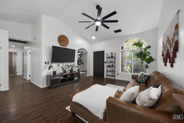 living area with visible vents, arched walkways, lofted ceiling, ceiling fan, and wood finished floors