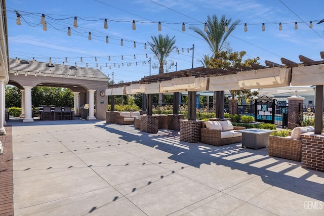 view of patio with fence, an outdoor hangout area, and a pergola