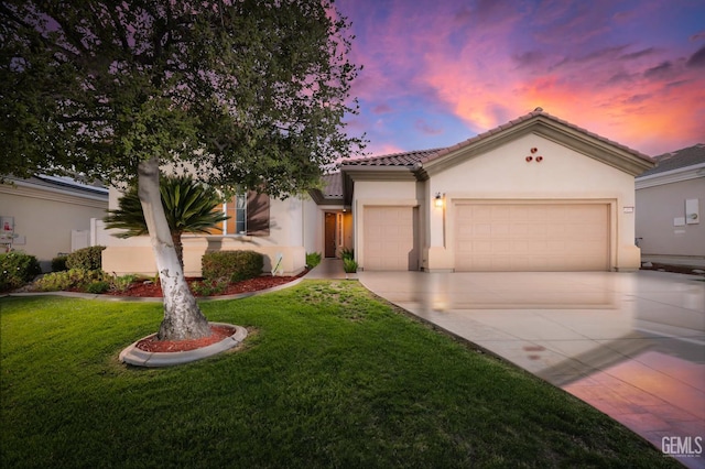 14010 Park Palisades Dr, Bakersfield, CA 93306 - mediterranean / spanish home featuring stucco siding, an attached garage, a tile roof, and concrete driveway