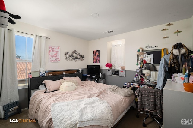 bedroom featuring carpet