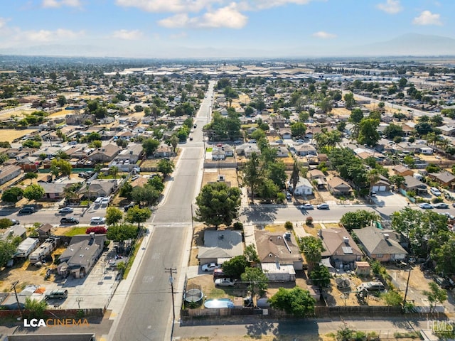 145 Kincaid St, Bakersfield, CA 93307 - aerial view of property and surrounding area with nearby suburban area and mountains
