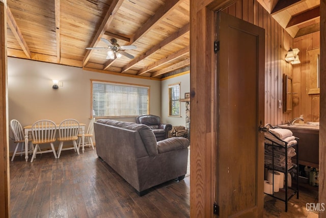 45985 Ridge Rd, Posey, CA 93260 - living area with beamed ceiling, a ceiling fan, dark wood-style flooring, and wood ceiling