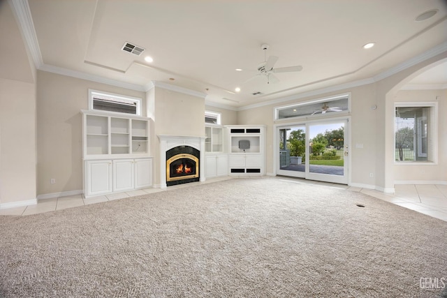 1904 Wedgemont Pl, Bakersfield, CA 93311 - unfurnished living room with a ceiling fan, tile patterned floors, ornamental molding, a fireplace, and arched walkways