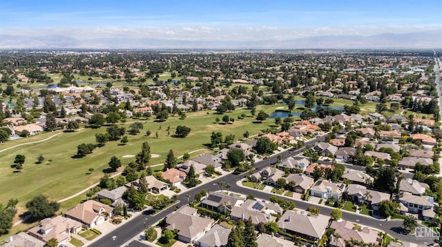 1904 Wedgemont Pl, Bakersfield, CA 93311 - aerial overview of property's location featuring a golf club, a water and mountain view, and nearby suburban area