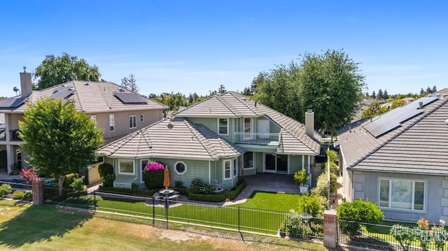 1904 Wedgemont Pl, Bakersfield, CA 93311 - view of front of property with a tile roof, a balcony, a chimney, and stucco siding