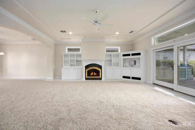 1904 Wedgemont Pl, Bakersfield, CA 93311 - unfurnished living room featuring ceiling fan, plenty of natural light, baseboards, a fireplace with flush hearth, and ornamental molding