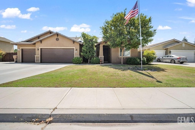 single story home featuring a garage and a front yard