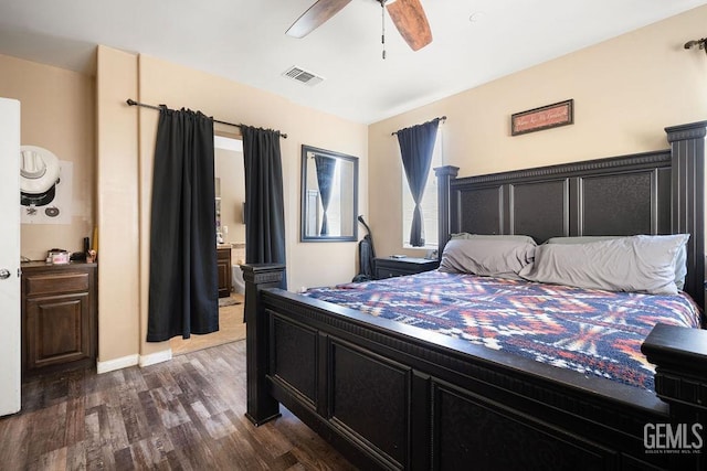 bedroom with ceiling fan, ensuite bath, and dark hardwood / wood-style flooring