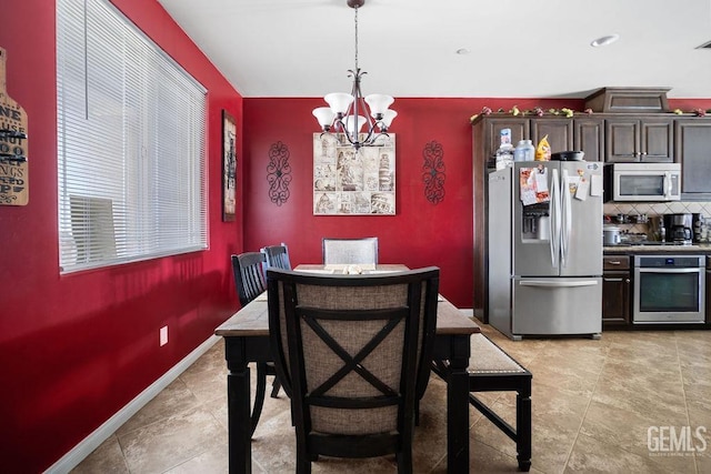 dining room featuring an inviting chandelier