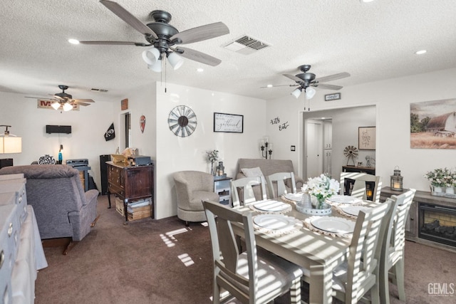404 Mckinley St, Taft, CA 93268 - carpeted dining room with ceiling fan and a textured ceiling