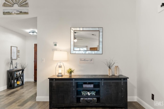 404 Mckinley St, Taft, CA 93268 - detailed view of wood finished floors and ceiling fan
