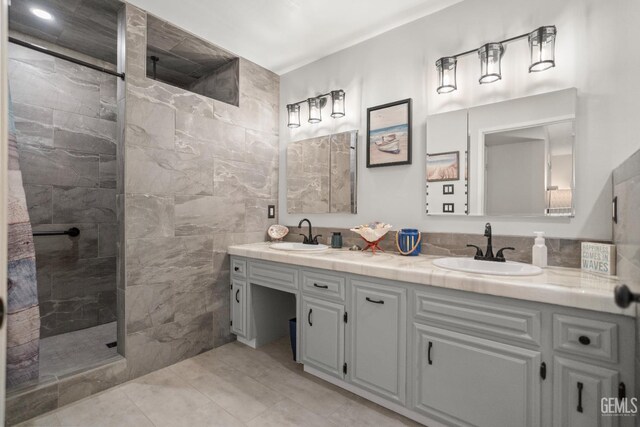 404 Mckinley St, Taft, CA 93268 - bathroom featuring double vanity, walk in shower, and tile walls