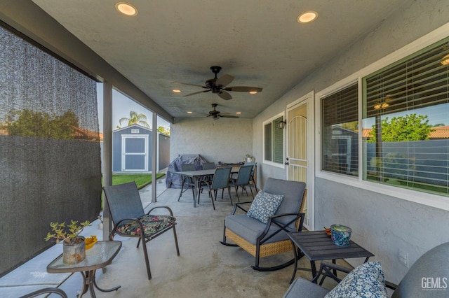 404 Mckinley St, Taft, CA 93268 - view of patio featuring a storage shed, outdoor dining space, and a ceiling fan