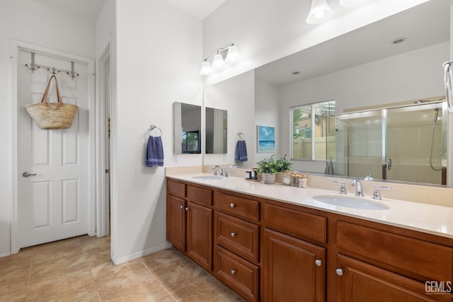 9700 Kingsport Pl, Bakersfield, CA 93306 - bathroom featuring double vanity, a stall shower, tile patterned flooring, and baseboards