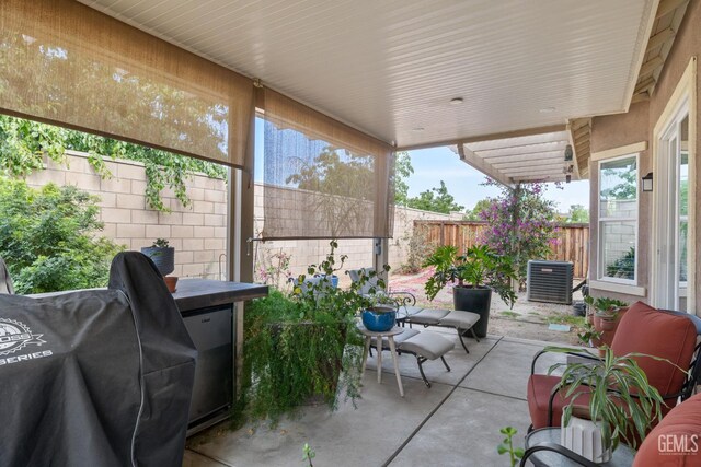 9700 Kingsport Pl, Bakersfield, CA 93306 - fenced backyard with a patio area, central AC unit, and area for grilling