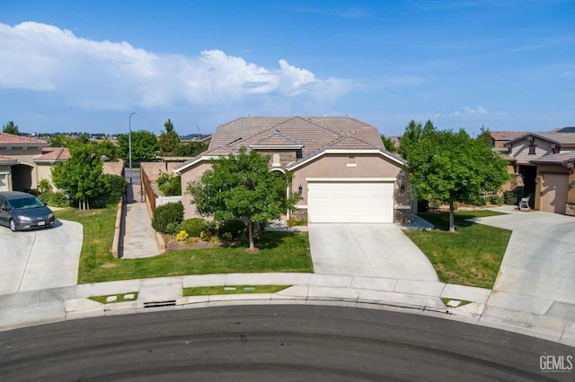 9700 Kingsport Pl, Bakersfield, CA 93306 - view of front facade featuring concrete driveway, an attached garage, stucco siding, a front lawn, and a tiled roof