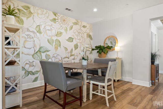 9700 Kingsport Pl, Bakersfield, CA 93306 - dining room featuring baseboards, wood finished floors, and recessed lighting