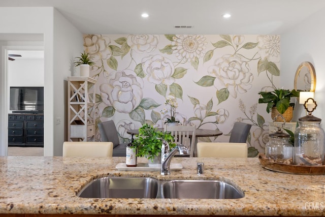 9700 Kingsport Pl, Bakersfield, CA 93306 - kitchen with a sink, light stone counters, and recessed lighting