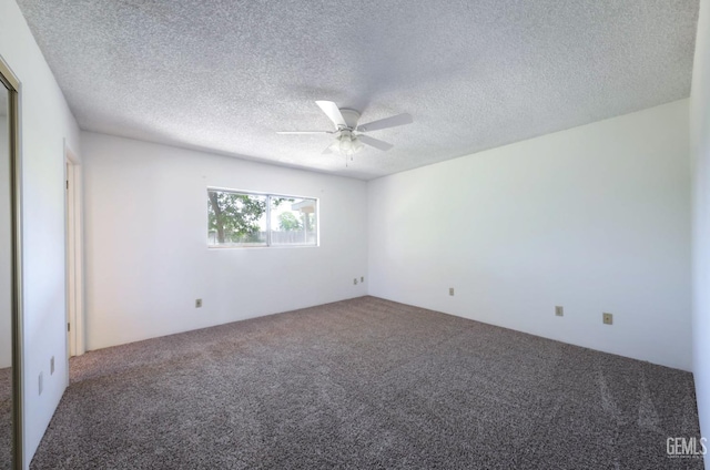 unfurnished bedroom featuring carpet, a ceiling fan, and a textured ceiling