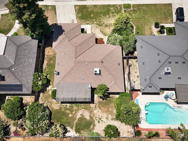 drone / aerial view of a pool