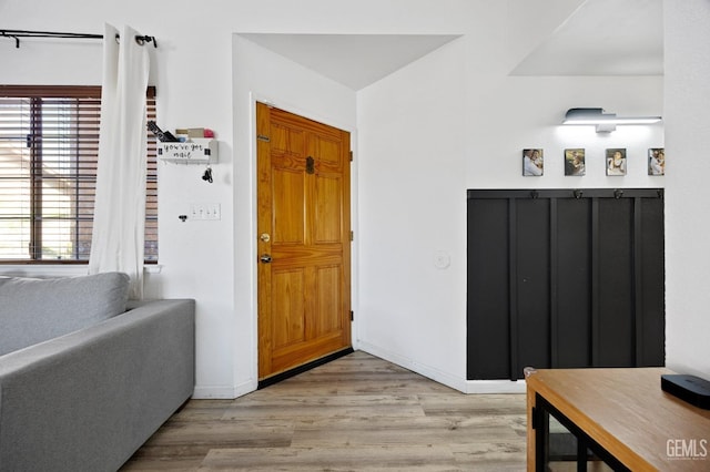 foyer entrance featuring light hardwood / wood-style flooring