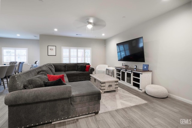 8615 Littleton St, Bakersfield, CA 93314 - living room with ceiling fan and light hardwood / wood-style floors