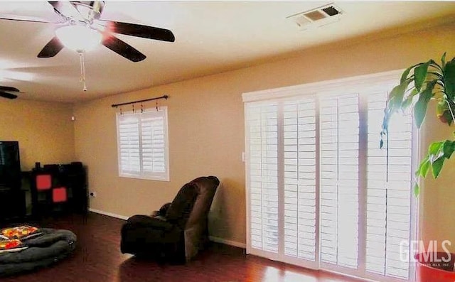 5429 White Wheat Ave, Bakersfield, CA 93313 - living area with a ceiling fan and wood finished floors