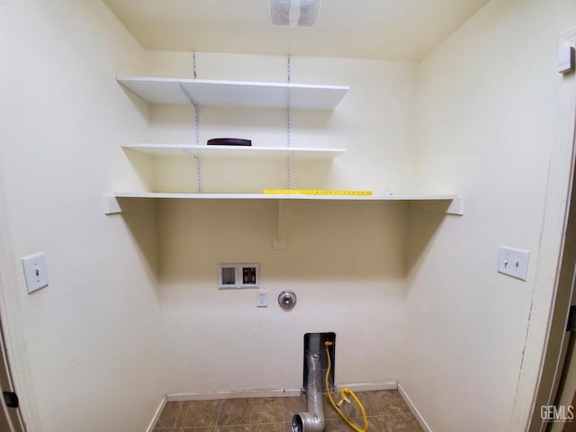 5429 White Wheat Ave, Bakersfield, CA 93313 - washroom featuring hookup for a washing machine and dark tile patterned flooring