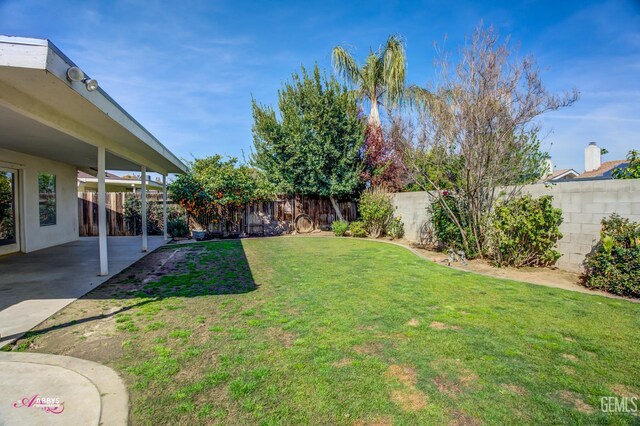 9812 Marilee Ave, Bakersfield, CA 93312 - view of yard featuring a patio area